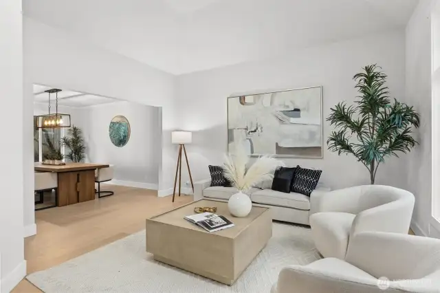 Formal living room flows nicely from entry through to the dining room