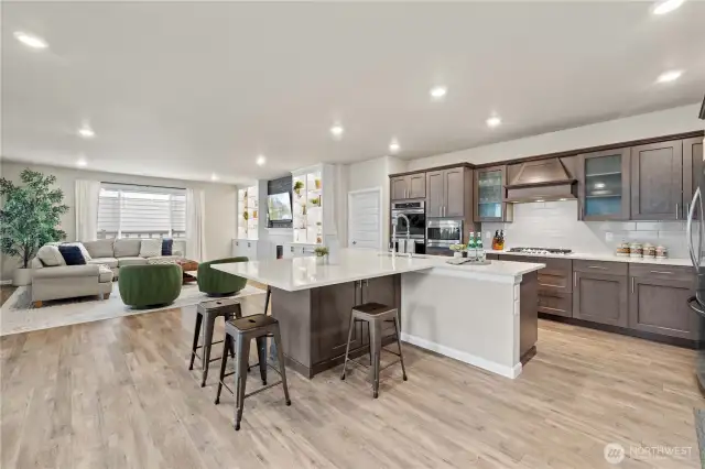 Kitchen with Stainless Appliances to Convey