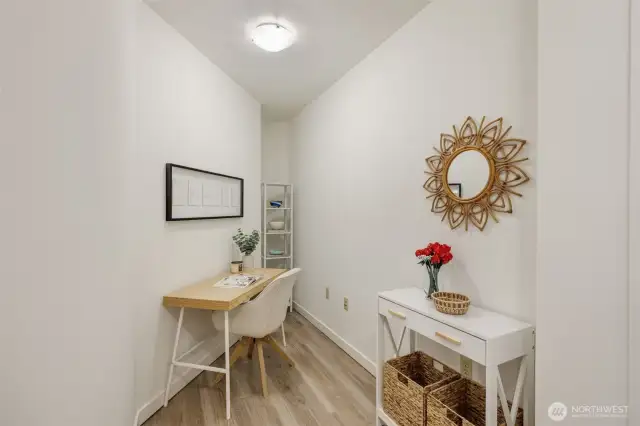 The versatile den is ideal for a cozy reading nook, creative space, or secluded home office.