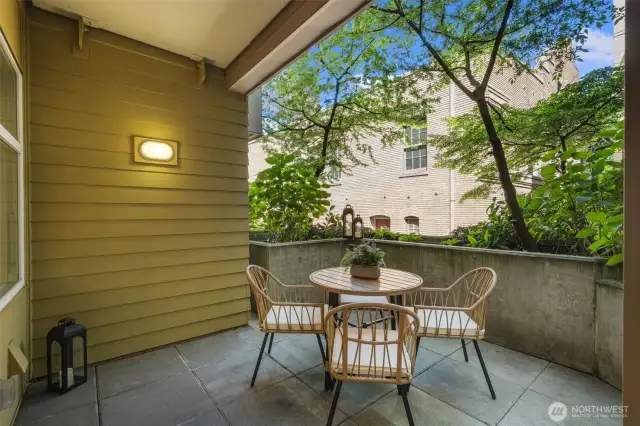 Step outside to a rare 114 sq ft private patio—surrounded by lush greenery, it’s your secret garden in the city.