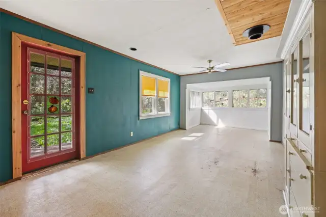 Living room, dining room, tv room ~ whatever you want, this house lives large for its square footage.