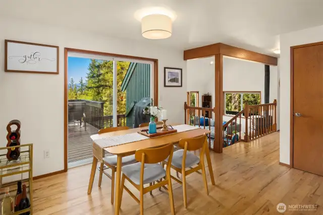 Dining area surrounded by windows.