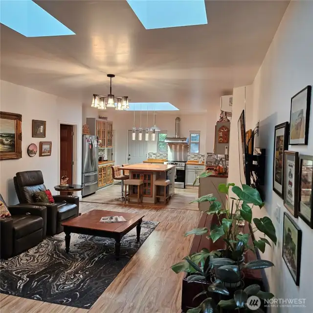 Living Room showcasing it natural light from Skylights