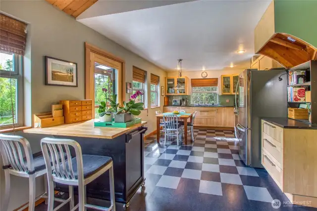 The cottage kitchen has ample warmth and character.