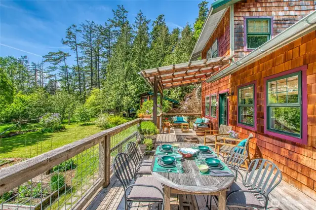 Dine al fresco on the large deck where you have hours of sunlight to enjoy entertaining and serenity.