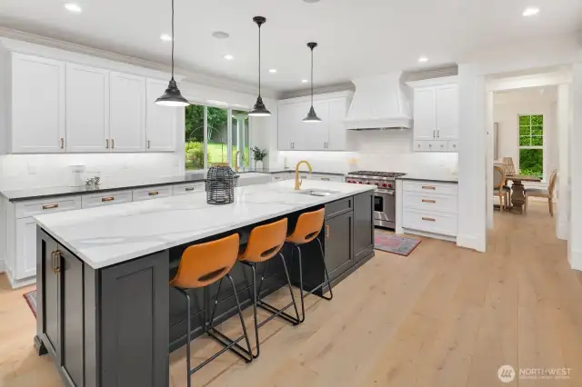 Stunning updated kitchen with HUGE island, high end appliances, double oven and double sink.