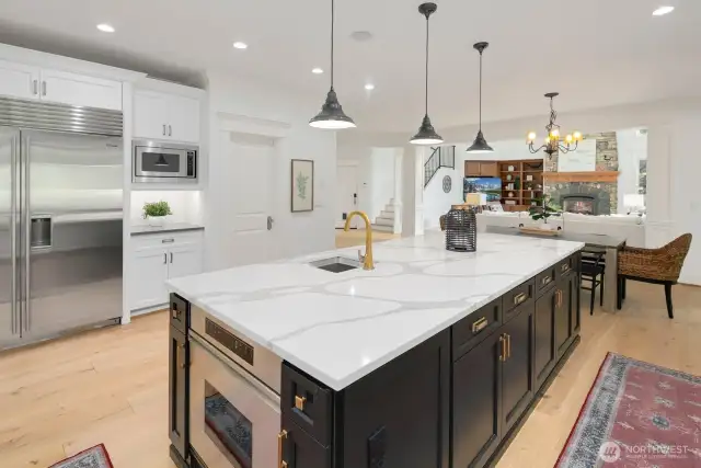 2nd prep sink, sub zero fridge, walk in pantry. Curated with attention to detail and at every turn.