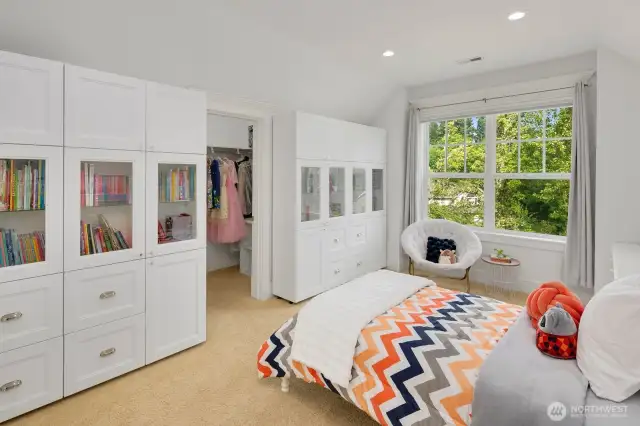 Large bedroom with built-ins and walk in closet