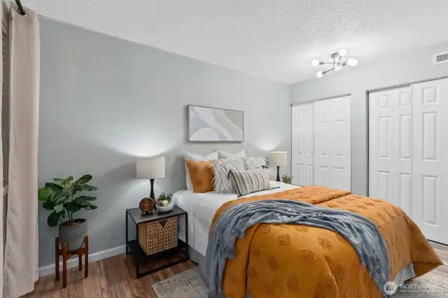 Has dual closets, fresh paint and new lighting
