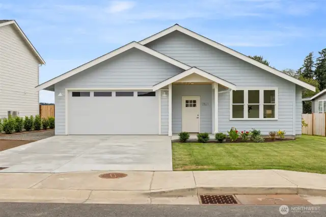 This brand new home has amazing curb appeal and is situated in such a lovely development along the shores of Drayton Harbor.