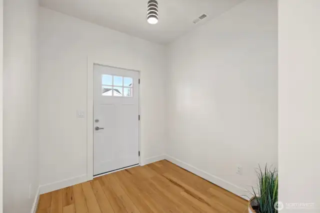 There is a spacious entry inside and the entire home is luxury vinyl tile flooring.