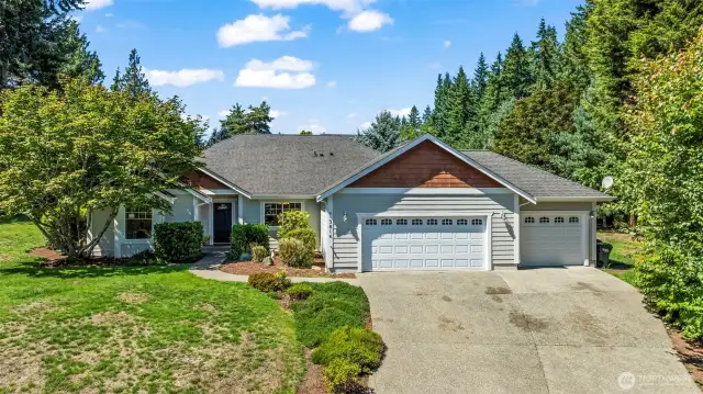 Sitting above the street at the end of the cul-de-sac this home is private, quiet and walk in ready!