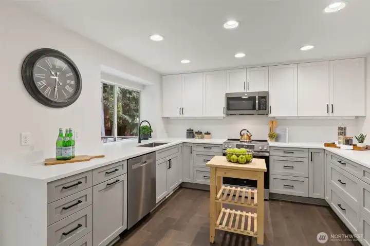 Engineered hardwood floors throughout the main level.
