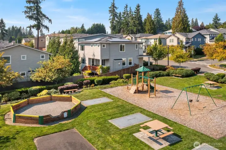 Home sits adjacent to community playground...walking trails and community pea patch near by.