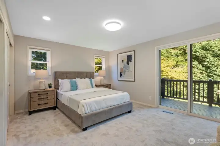 Owner's suite with sliding door to private deck
