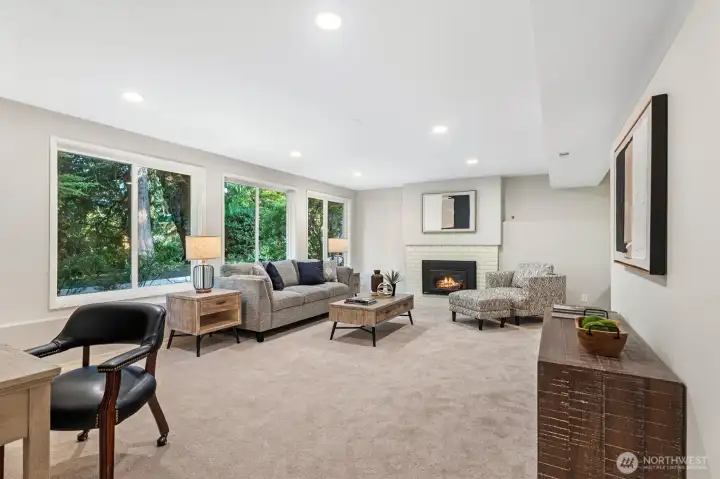 Large lower level family room with bonus alcove for play area or den/office