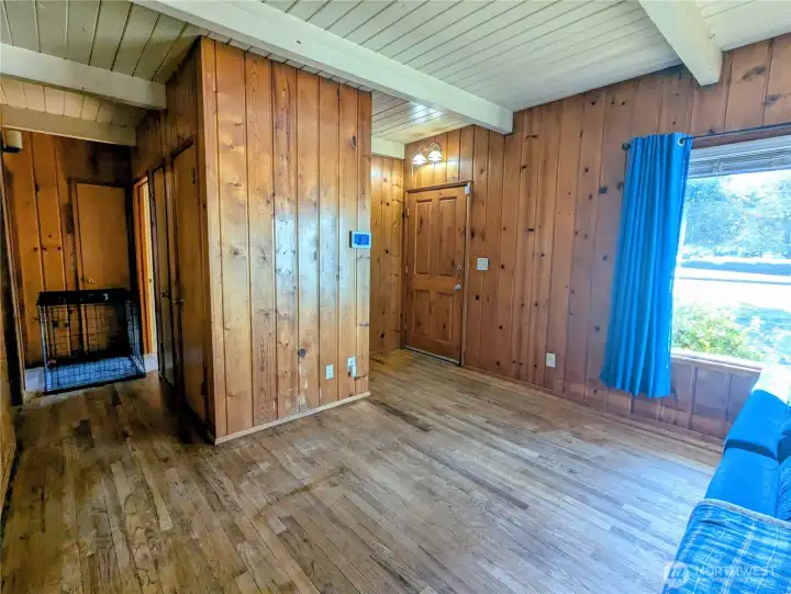 Front door entry view and hallway to bedrooms