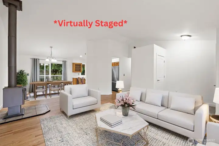 *Virtually Staged* Living room opens to dining
