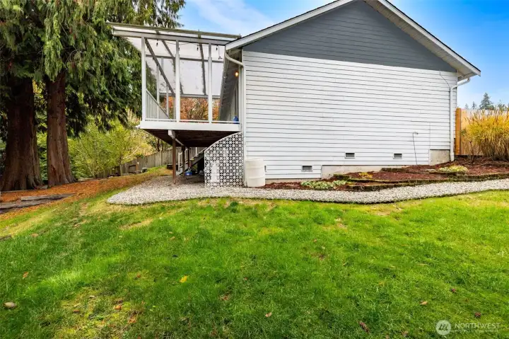 Large, grassy side yard