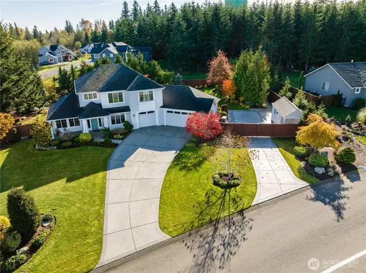 Beautiful 2-story on over an acre of meticulously manicured grounds. 3 car garage plus RV/boat parking pad. 2 driveways and double gates on 2nd driveway.