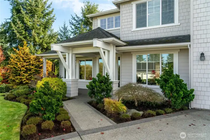 Upgraded exposed concrete sidewalk and driveway.