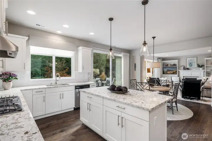 The kitchen is open to the family room and has a slider out to the oversized patio for grilling or relaxing.