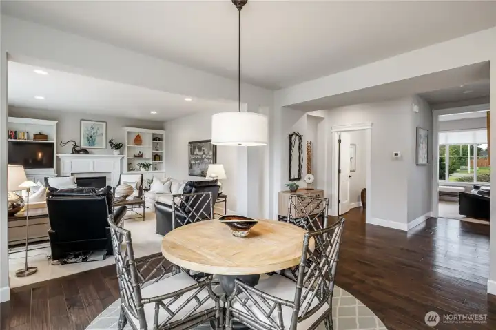 Great room concept! Nook area off the kitchen, family area to the left, 1/2 bathroom ahead and office to the right.