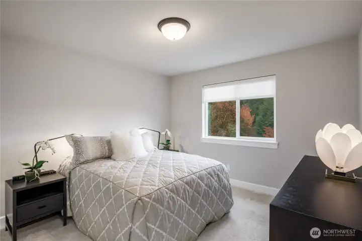 The 3rd bedroom is good sized with fresh paint and is sitting on the west side for extra privacy.