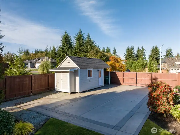 A custom second driveway & gates were added for RV or boat parking.