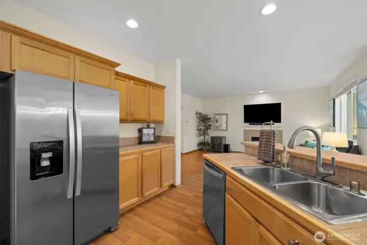 Generous counter space, stainless appliances, and a central prep zone make everyday cooking both effortless and enjoyable.