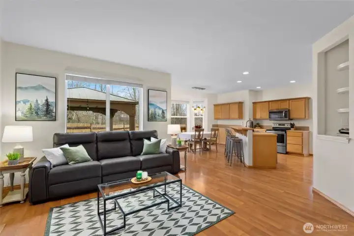 Spacious and welcoming, this great room balances comfort and scale with easy access to the outdoors.