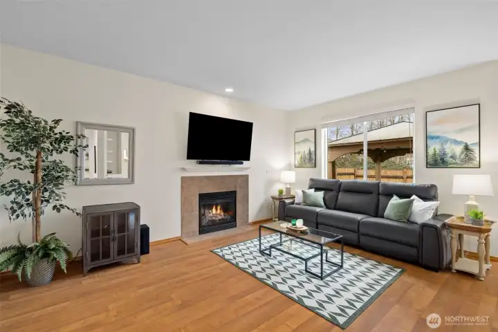 Large picture windows capture beautiful light and leafy views, bringing the Northwest landscape inside.