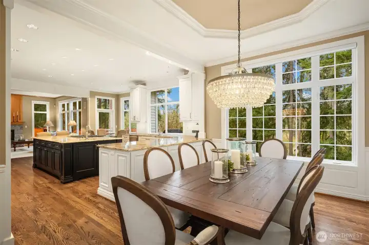 Beautiful wood floors throughout the main level. The floorplan provides flexible and comfortable living, including a den/office and upper-floor bonus room with surround sound.  Dual staircases provide easy access to the upper level.