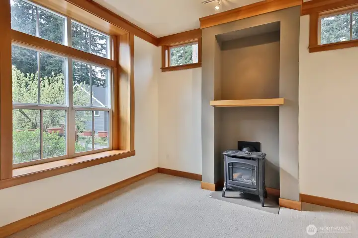 A fantastic window package allows for ample light as well as privacy. There are multiple windows that take in the evergreen trees.