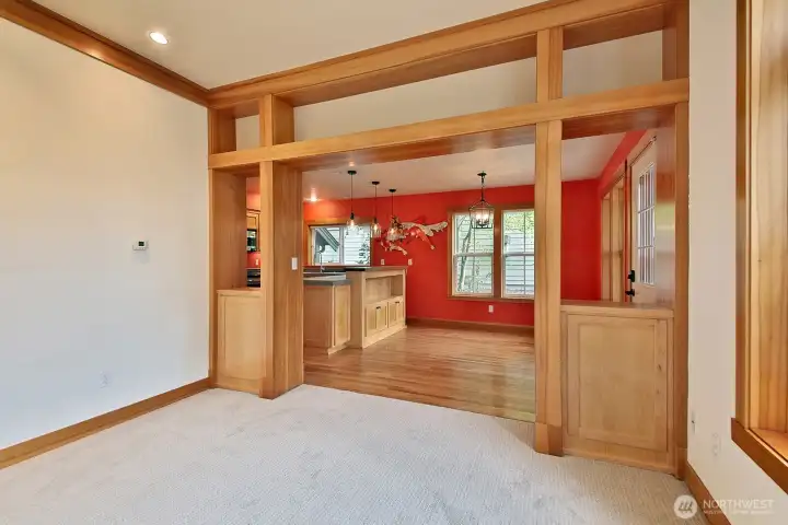 There are built in cabinets and shelves to display personal items and artwork.