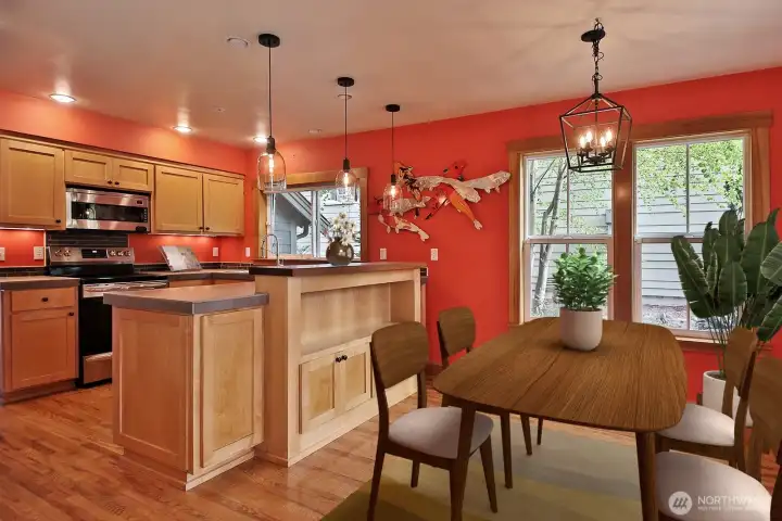 Open kitchen to the dining area.  Virtually staged.