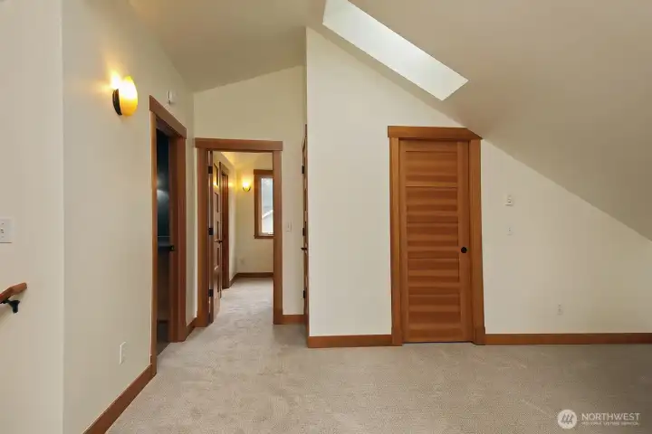 There is ample storage and room for multiple furnishings in this "flex space".