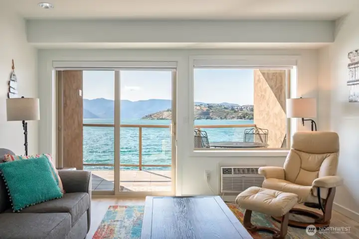 Unobstructed up lake view right from your living room and private deck.