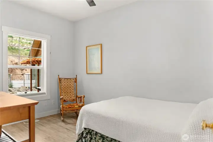 Comfortable main-level second bedroom with generous proportions, ideal for guests or everyday living.