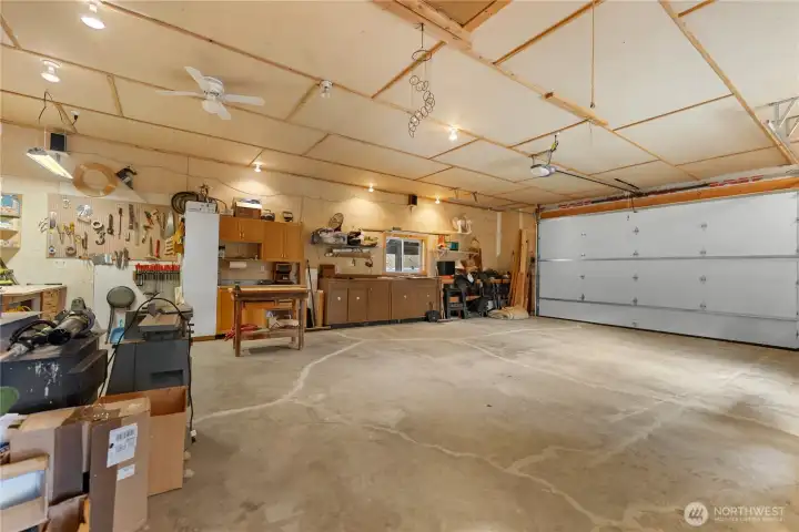 Spacious, fully finished shop with ample room for projects, storage, and equipment—ideal for hobbies, workspace, or year-round functionality.