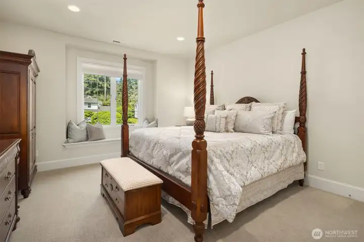 Second upstairs bedroom with window seat. All bedrooms feature high-end carpeting.