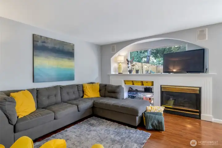 A generously sized living room big enough for a large sectional couch! The living room is flooding with light from your private backyard patio!