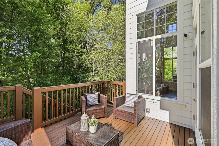 Nice deck off the kitchen is perfect for summer evening beverages or morning coffee. Over looks serene greenbelt.