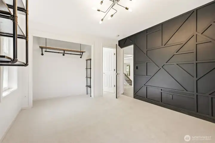 One of the four bedrooms on the upper level.