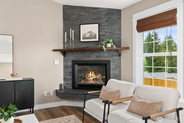 Main floor living with gas fireplace & new updated flooring. Main floor living with gas fireplace & new updated flooring.