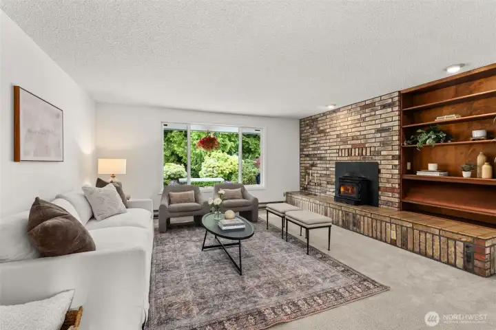 Front living room with wood burning fire place insert. Front living room with wood burning fire place insert.