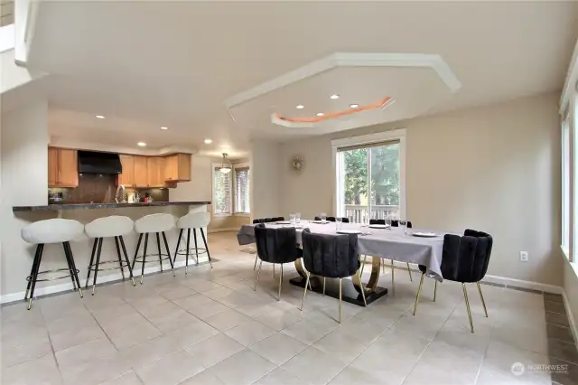 Huge dining room right of the kitchen ready to host the perfect get together.