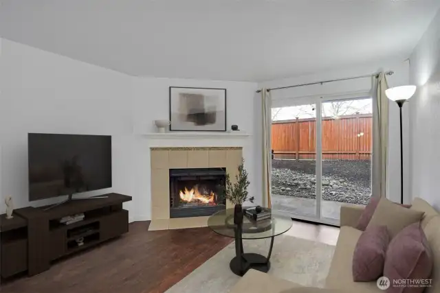 A simple and elegant fireplace brings warmth and ambiance to the room.