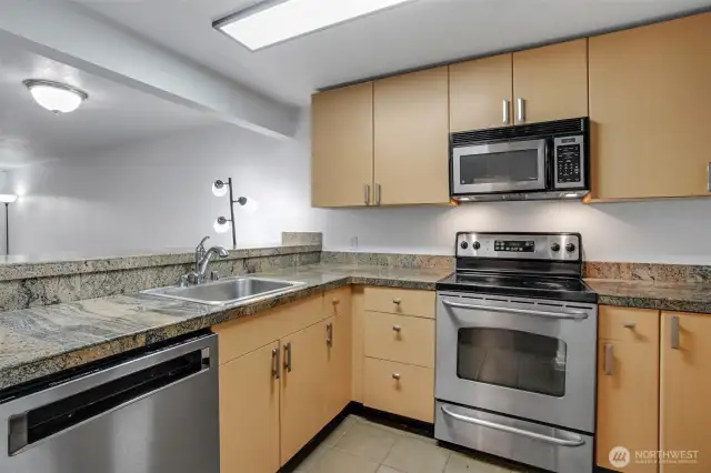 Stainless steel appliances highlight the kitchen and are all included in the sale of the home.