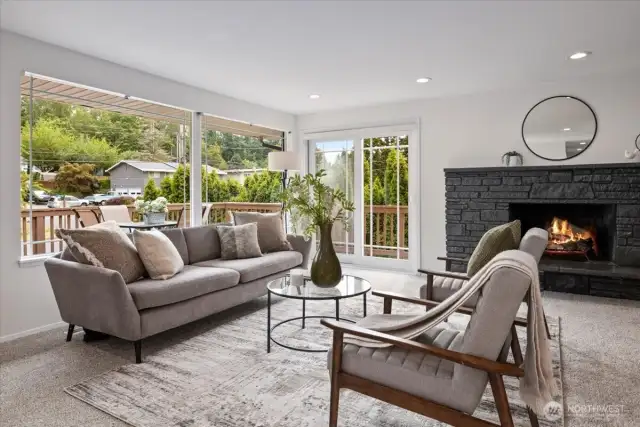 Large picture window captures the views from the deck. Enjoy your morning coffee in peace, or fire up the grill for your dinner guests.